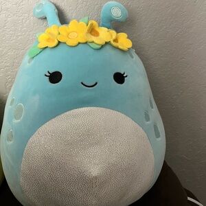 Blue Plush Bug with Yellow Flower Crown